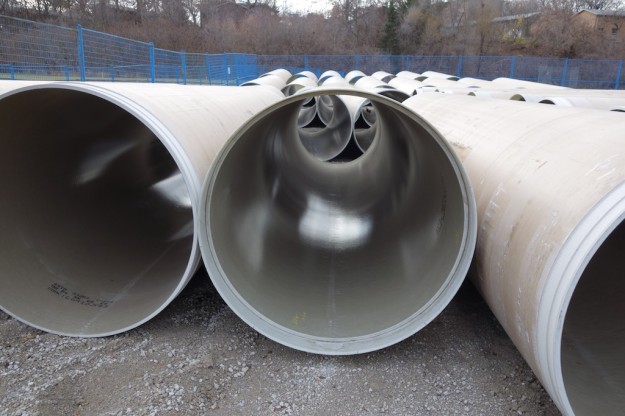 Sewer pipe linings awaiting placement.
